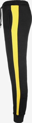 PUMA Tapered Sportbroek 'Borussia Dortmund' in Zwart