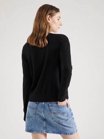 Pull-over Tommy Jeans en noir