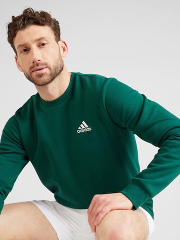 ADIDAS SPORTSWEAR Αθλητική μπλούζα φούτερ 'Essentials' σε πράσινο
