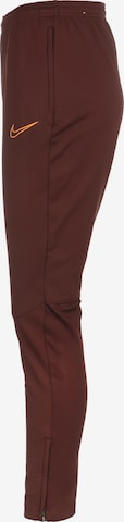 NIKE Slim fit Workout Pants 'Academy' in Brown