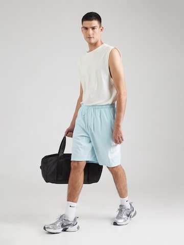 Nike Sportswear Широка кройка Панталон 'CLUB' в синьо
