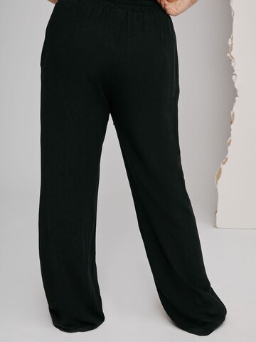 A LOT LESS Loose fit Pleat-front trousers 'Giovanna' in Black