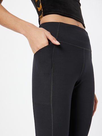 Girlfriend Collective Skinny Leggings in Schwarz