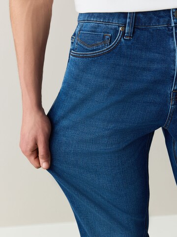 Next Slimfit Jeans 'Motionflex' i blå