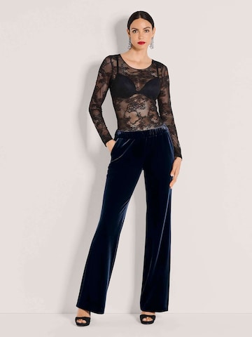 MADELEINE Regular Trousers in Blue: front