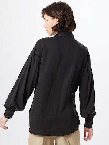 NU-IN - Blusa en negro