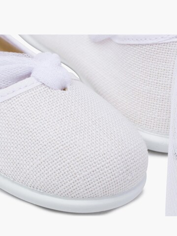 Pisamonas - Bailarina en blanco