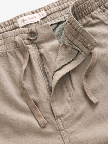 regular Pantaloni di Next in grigio