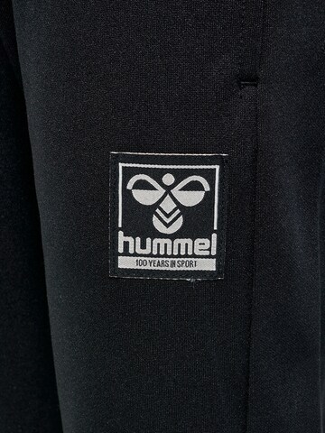 Effilé Pantalon Hummel en noir