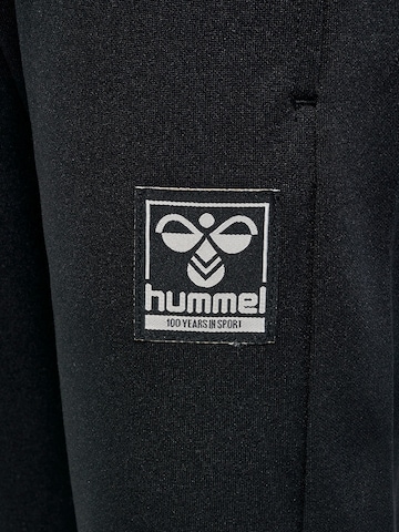 Effilé Pantalon Hummel en noir