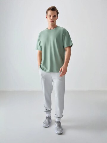 Tommy Life T-Shirts in Grün: Vorderseite