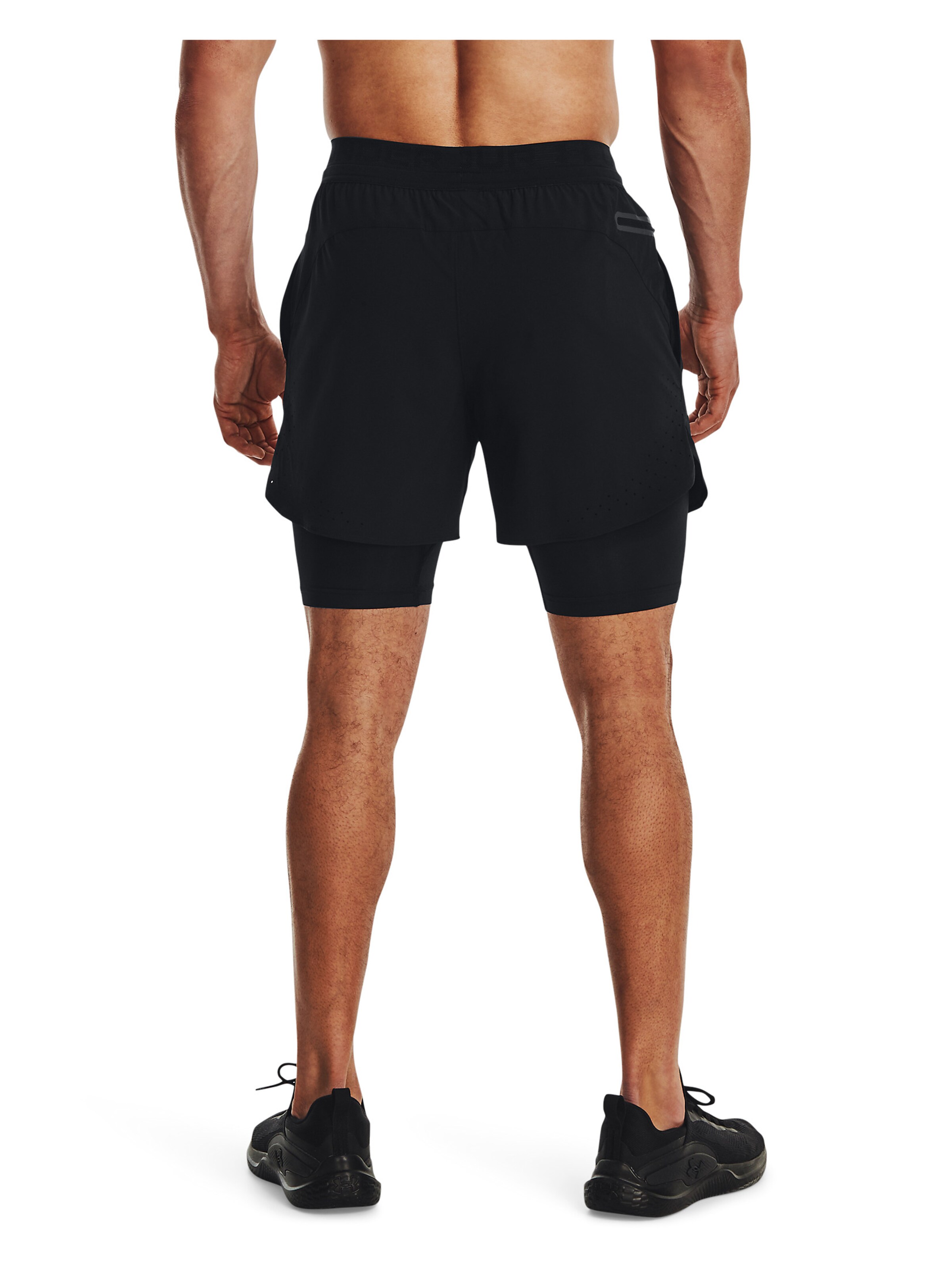 UNDER ARMOUR Regular Sports trousers in Black