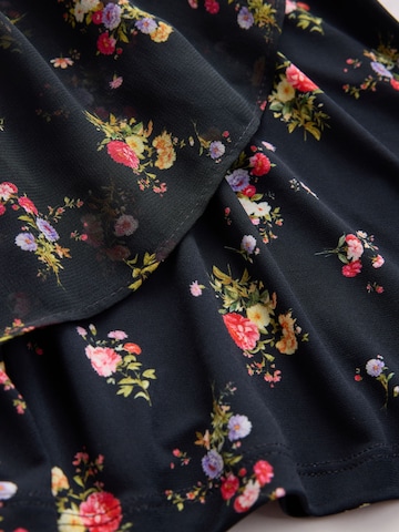 Next - Blusa en negro