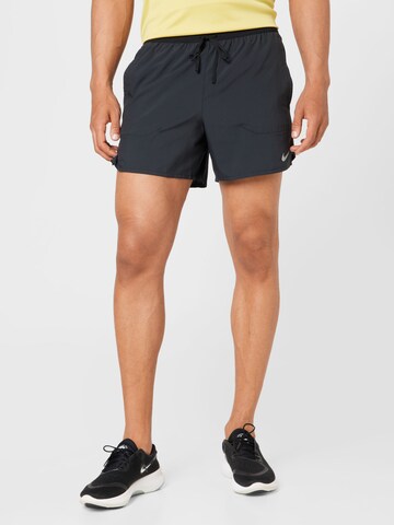 NIKE Regular Sports trousers 'Stride' in Black: front