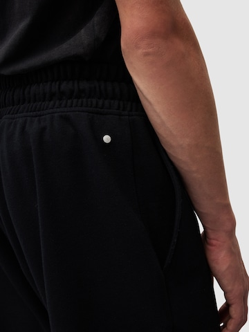 Regular Pantaloni 'HELIX' de la AllSaints pe negru