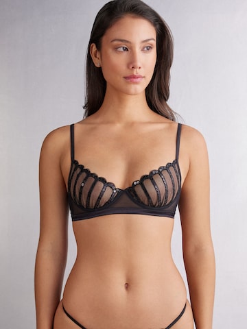 INTIMISSIMI T-shirt Bra 'SEE THE MAGIC' in Black: front