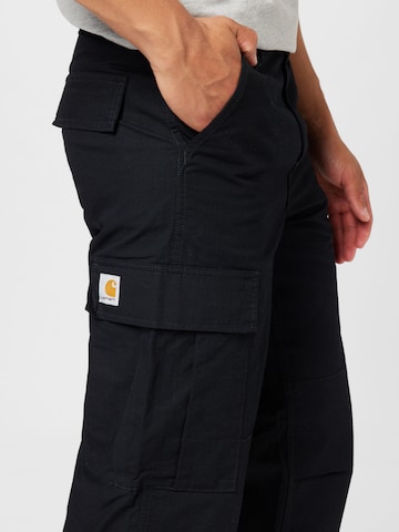 Carhartt WIP tavaline Klapptaskutega püksid, värv must