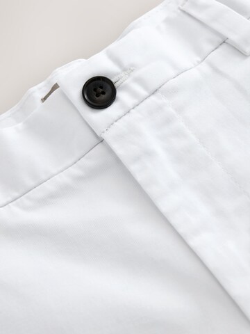 Next Úzky strih Nohavice - Biela