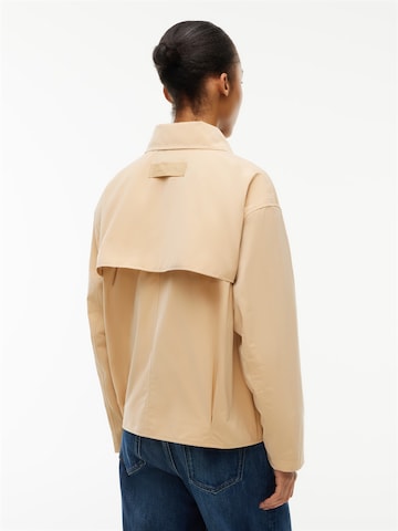 Tommy Jeans Välikausitakki värissä beige