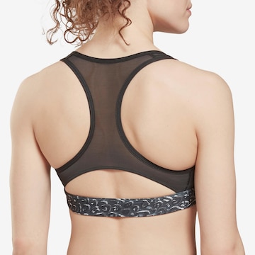 Reebok Bustier Športni nederček | črna barva