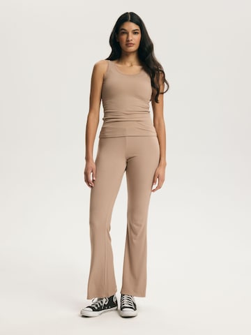 ESOTIQ - Acampanado Pantalón 'Haushose Schlaghose Viskose Mix weich bequem elastischer Bund Clear' en beige
