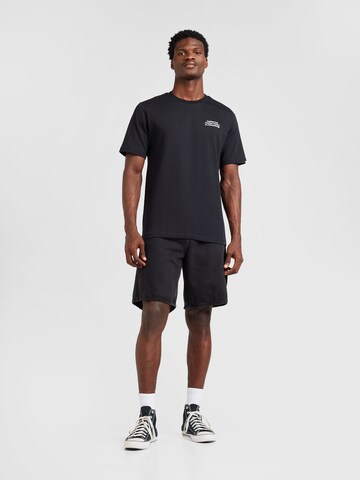 anerkjendt T-Shirt 'AKKIKKI' in Schwarz