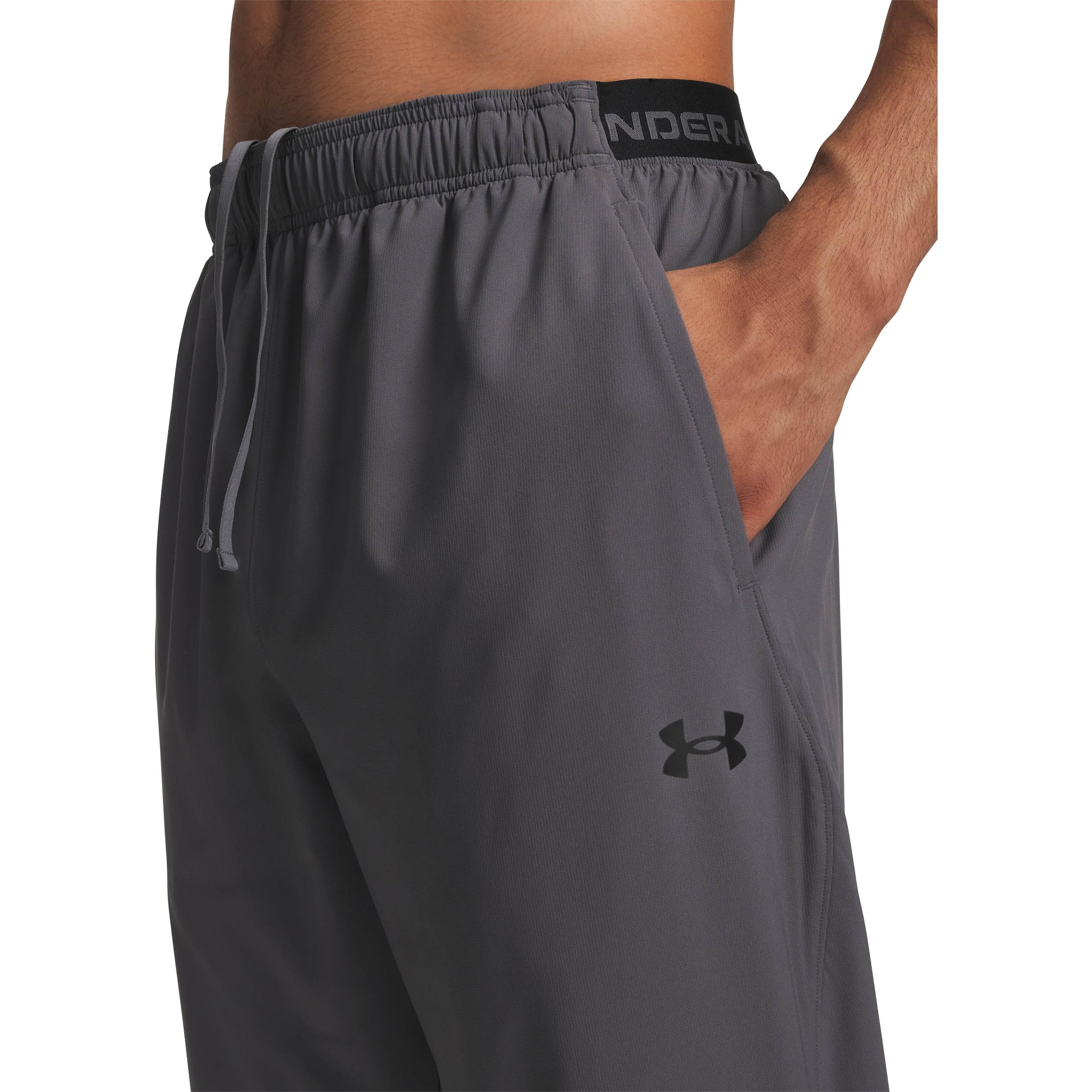 UNDER ARMOUR Tapered Workout Pants in Grey