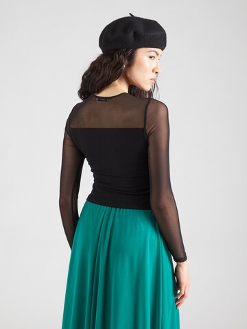 T-shirt 'Leyla' ABOUT YOU en noir