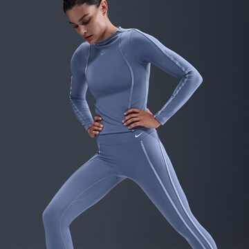 NIKE Skinny Workout Pants in Purple