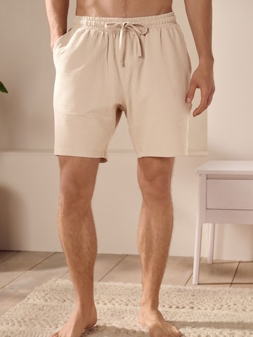 Next Pyjamahousut värissä beige: etupuoli