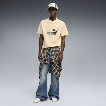 PUMA T-Shirt 'Essentials Elevated No.1' in Gelb