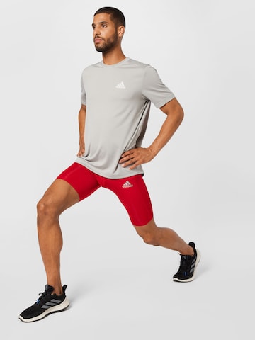 ADIDAS SPORTSWEAR - Skinny Pantalón deportivo 'Techfit ' en rojo