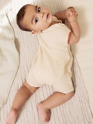 Tutina / body per bambino di Next in beige