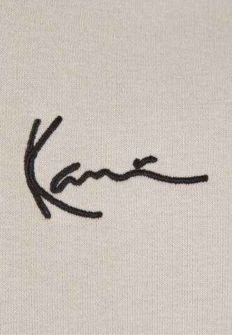 Veste de survêtement 'Essential' Karl Kani en beige