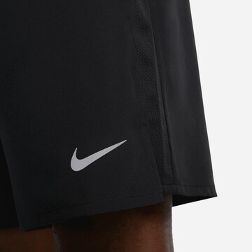 NIKE Regular Workout Pants in Black