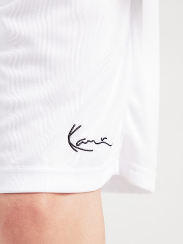 Karl Kani - Loosefit Pantalón en blanco