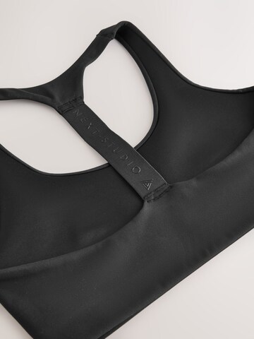Next Bustier Sport-BH in Schwarz