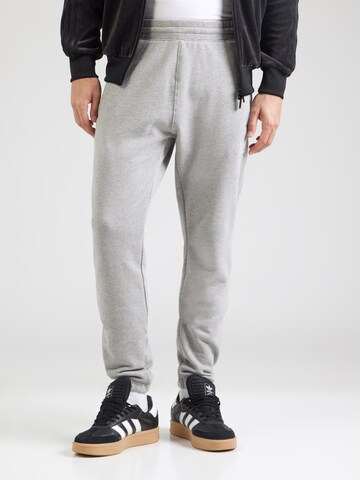 ADIDAS ORIGINALS Конический (Tapered) Штаны 'ESS' в Серый: спереди