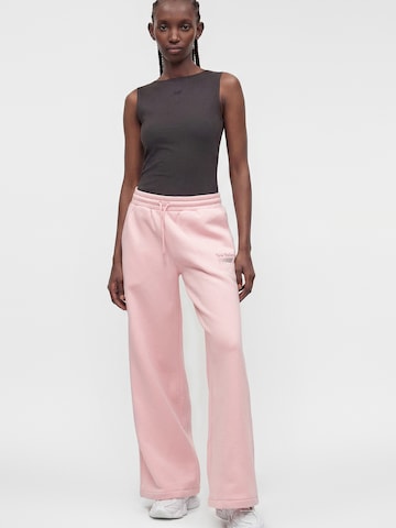 Wide leg Pantaloni di new balance in rosa