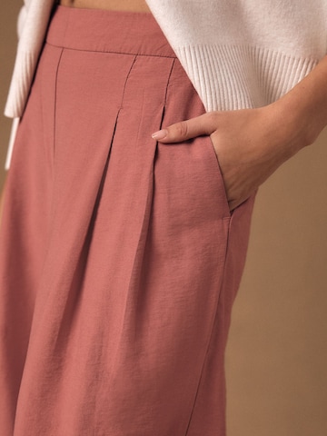 Next Široke hlačnice Hlače | roza barva