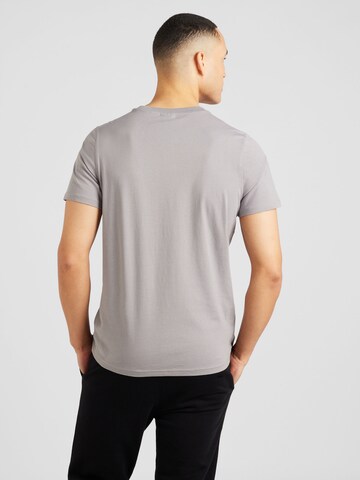 T-Shirt fonctionnel 'The Hooper' PUMA en gris