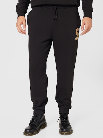 !Solid Tapered Trousers in Black: front