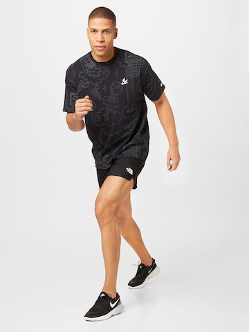 NIKE Functioneel shirt 'M90 Max' in Zwart