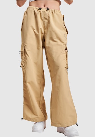Loosefit Pantaloni di Karl Kani in beige