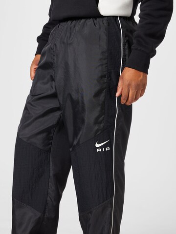 Effilé Pantalon Nike Sportswear en noir