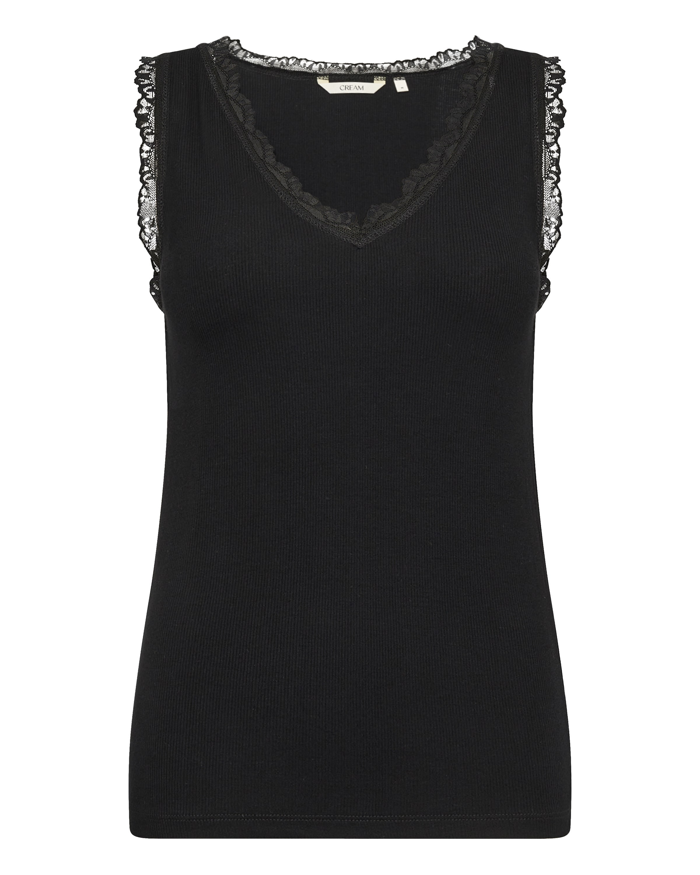 melns Cream Topiņš 'Yuni': no priekšpuses