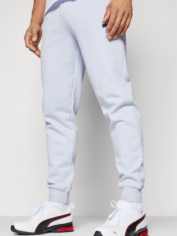 PUMA - Tapered Pantalón deportivo 'ESS 2 No. 1' en gris