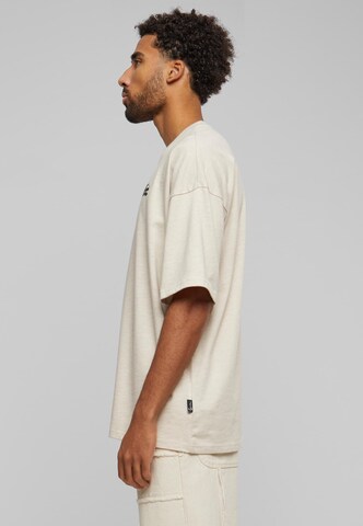 T-Shirt Karl Kani en beige