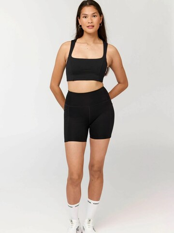 Girlfriend Collective Regular Housut ' Pocket ' värissä musta