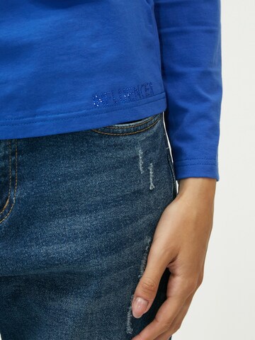 Maglietta di Influencer in blu